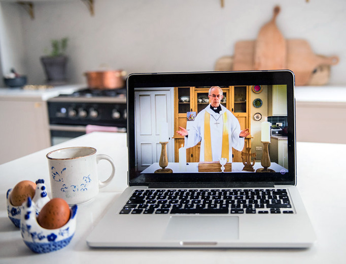 In this photo illustration the Anglican archbishop of Canterbury, Justin Welby, gives the first national digital Easter Sunday service from his kitchen at Lambeth Palace on April 12 in London, England. In this photo illustration the Anglican archbishop of Canterbury, Justin Welby, gives the first national digital Easter Sunday service from his kitchen at Lambeth Palace on April 12 in London, England.
