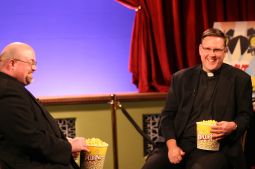 ON THE AIR. Father Bill Kelly, left, and Father Chip Hines appear in a movie review show on CatholicTV, which will now be carried by Comcast. ON THE AIR. Father Bill Kelly, left, and Father Chip Hines appear in a movie review show on CatholicTV, which will now be carried by Comcast.