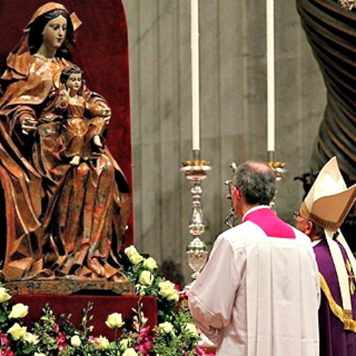Pope Francis prays before a statue of Mary in St. Peter’s Basilica.
Pope Francis prays before a statue of Mary in St. Peter’s Basilica.