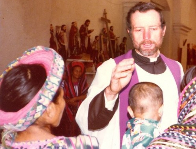 Father Stanley Rother blesses a baby and celebrates Mass in Guatemala.
Father Stanley Rother blesses a baby and celebrates Mass in Guatemala.