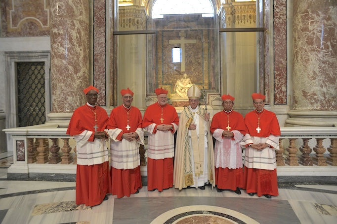Pope Francis with the five new cardinals. Pope Francis with the five new cardinals.