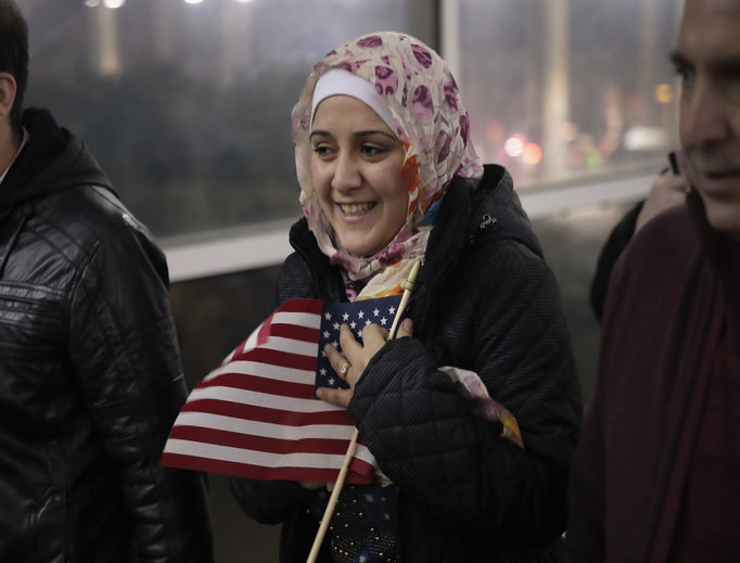Syrian refugee Baraa Haj Khalaf clutches an American flag as she leaves O’Hare Airport with her family after arriving on a flight from Istanbul, Turkey, on Feb. 7 in Chicago. She arrived in the United States with her husband and daughter after spending five years in a refugee camp in Turkey. She was allowed to enter due to the temporary halt to the executive order.
Syrian refugee Baraa Haj Khalaf clutches an American flag as she leaves O’Hare Airport with her family after arriving on a flight from Istanbul, Turkey, on Feb. 7 in Chicago. She arrived in the United States with her husband and daughter after spending five years in a refugee camp in Turkey. She was allowed to enter due to the temporary halt to the executive order.