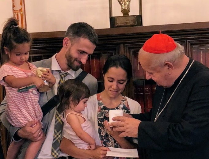 Above, the MacDonald family with Cardinal Stanisław Dziwicz as he gives them a relic of John Paul II. Below, a student at Belmont Abbey College venerates the traveling relic of John Paul II; the first group of college students at this summer’s JP2 Project.
Above, the MacDonald family with Cardinal Stanisław Dziwicz as he gives them a relic of John Paul II. Below, a student at Belmont Abbey College venerates the traveling relic of John Paul II; the first group of college students at this summer’s JP2 Project.