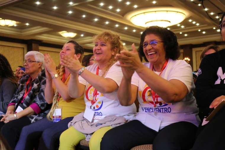 Carmen Ciriaco and Dr. Perla Indarte of Brooklyn and Mayra Reyes of Santa Fe cheer during a ‘V Encuentro’ session. Carmen Ciriaco and Dr. Perla Indarte of Brooklyn and Mayra Reyes of Santa Fe cheer during a ‘V Encuentro’ session.