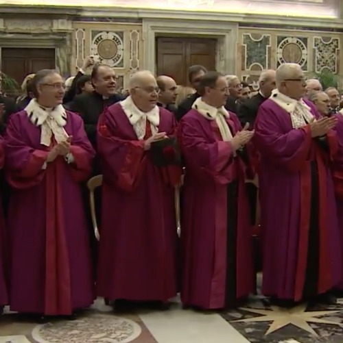 Members of the Roma Rota greet Pope Francis Jan. 23 at the Vatican. Members of the Roma Rota greet Pope Francis Jan. 23 at the Vatican.