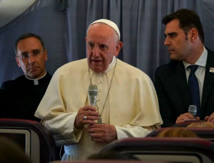 Pope Francis aboard the papal plane returning from Romania June 2, 2019. Pope Francis aboard the papal plane returning from Romania June 2, 2019.