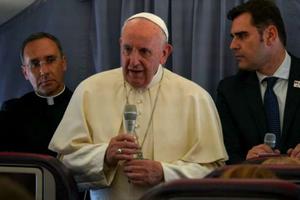 Pope Francis aboard the papal plane returning from Romania June 2, 2019. Pope Francis aboard the papal plane returning from Romania June 2, 2019.