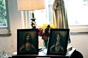 The Sacred Heart and Immaculate Heart images have pride of place in the Wilson home. The Sacred Heart and Immaculate Heart images have pride of place in the Wilson home.