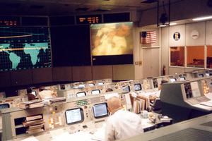 Above, mission control is seen during the perilous mission: Catholic flight director Gene Kranz, with his back to the camera at right center, watches a TV transmission from the Apollo 13 crew moments before the accident that crippled the mission on April 13, 1970. Astronaut Fred Haise can be seen on the large screen at the upper right. Above, mission control is seen during the perilous mission: Catholic flight director Gene Kranz, with his back to the camera at right center, watches a TV transmission from the Apollo 13 crew moments before the accident that crippled the mission on April 13, 1970. Astronaut Fred Haise can be seen on the large screen at the upper right.