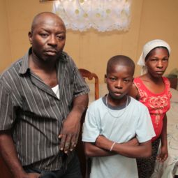Gregoire Jean and his wife, Macula Louis, pose with their son, Makendas Jean, in their home in the Delmas 33 neighborhood of Port-au-Prince, Haiti, March 13. The family spent more than a year in a tent camp after the 2010 earthquake before feeling safe to return home. Gregoire Jean and his wife, Macula Louis, pose with their son, Makendas Jean, in their home in the Delmas 33 neighborhood of Port-au-Prince, Haiti, March 13. The family spent more than a year in a tent camp after the 2010 earthquake before feeling safe to return home.