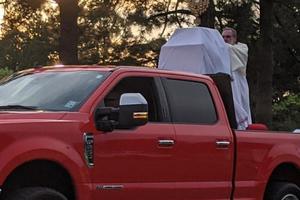 Monsignor Daniel Torres of Our Lady Queen of Heaven Catholic church holding the Blessed Sacrament. Monsignor Daniel Torres of Our Lady Queen of Heaven Catholic church holding the Blessed Sacrament.