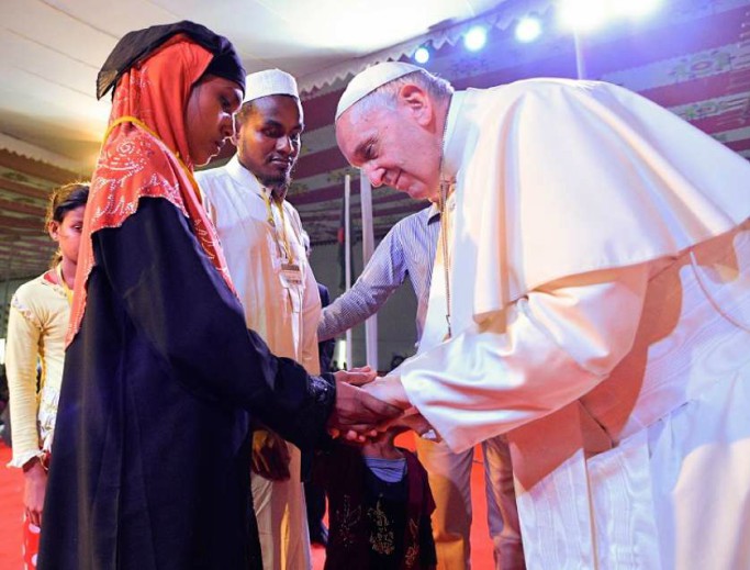 Pope Francis greets members of the Rohingya Muslim community in Dhaka, Bangladesh, on Dec. 1, 2017. Pope Francis greets members of the Rohingya Muslim community in Dhaka, Bangladesh, on Dec. 1, 2017.