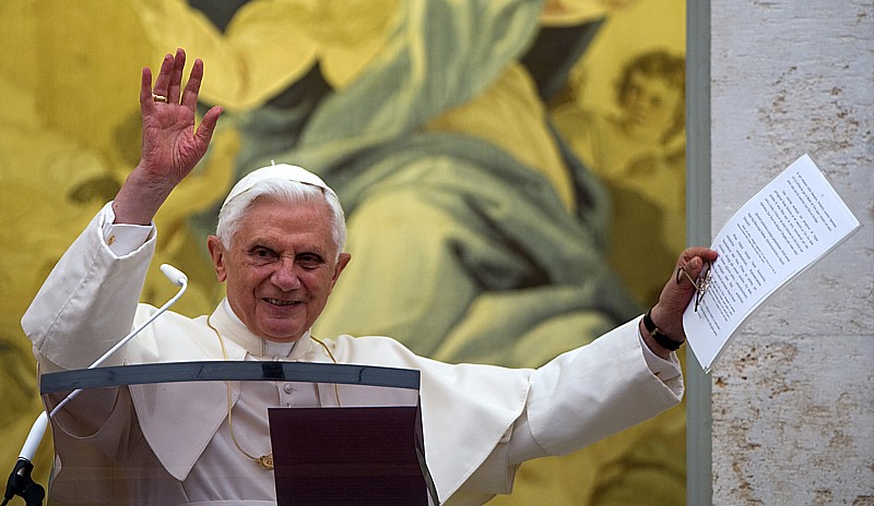 Pope Benedict XVI waves from the balcony during his Angelus prayer Aug. 15, the feast of the Assumption of Mary, at his summer residence in Castel Gandolfo, Italy. Pope Benedict XVI waves from the balcony during his Angelus prayer Aug. 15, the feast of the Assumption of Mary, at his summer residence in Castel Gandolfo, Italy.