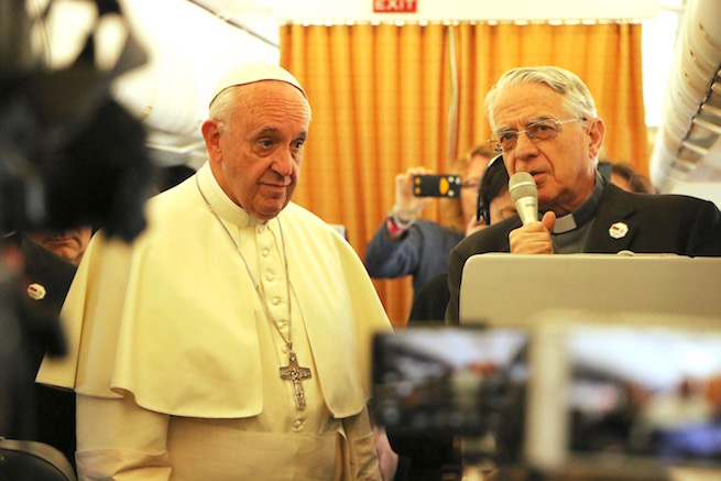 Pope Francis and Father Federico Lombardi speaking to reporters on the papal plane to Armenia, June 24, 2016 Pope Francis and Father Federico Lombardi speaking to reporters on the papal plane to Armenia, June 24, 2016