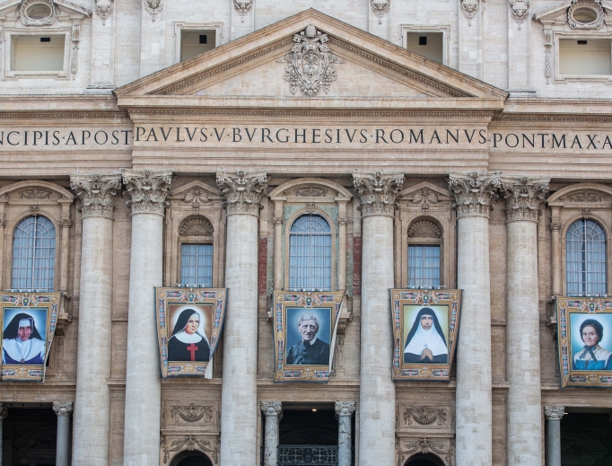 The official canonization banners of the five new saints hang in St. Peter's Square. The official canonization banners of the five new saints hang in St. Peter's Square.