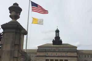 U.S. and Vatican flags fly at St. Charles Borromeo Seminary outside of Philadelphia. U.S. and Vatican flags fly at St. Charles Borromeo Seminary outside of Philadelphia.