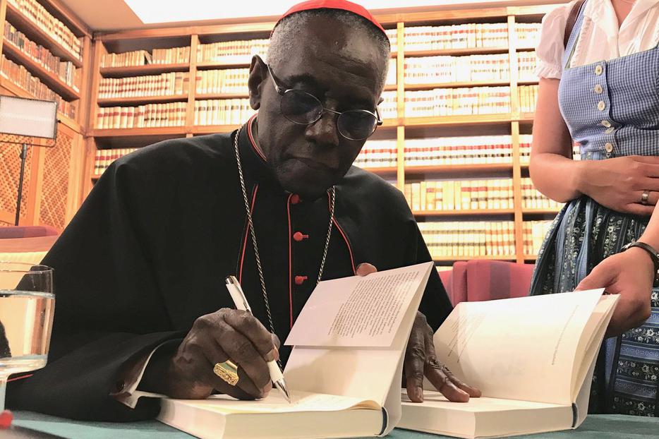 Cardinal Robert Sarah signing his book 'The Power of Silence' in Rome, May 24, 2017. Cardinal Robert Sarah signing his book 'The Power of Silence' in Rome, May 24, 2017.