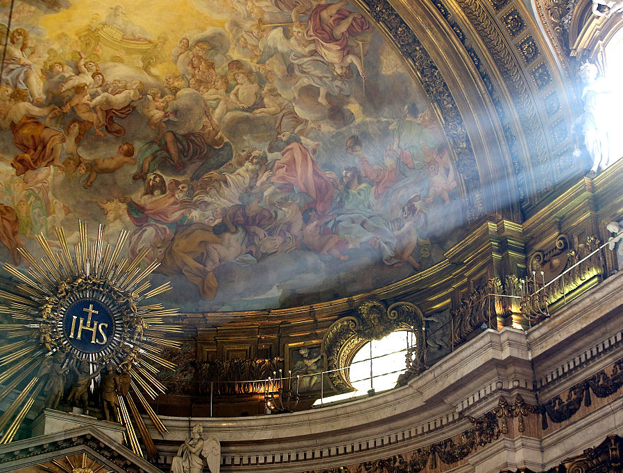 A ray of sunlight shines on the emblematic Jesuit Christogram over the main altar of the Church of the Gesù during a Mass offered by the newly-elected Jesuit Father Arturo Sosa Abascal, Oct. 15, 2016, in Rome. A ray of sunlight shines on the emblematic Jesuit Christogram over the main altar of the Church of the Gesù during a Mass offered by the newly-elected Jesuit Father Arturo Sosa Abascal, Oct. 15, 2016, in Rome.