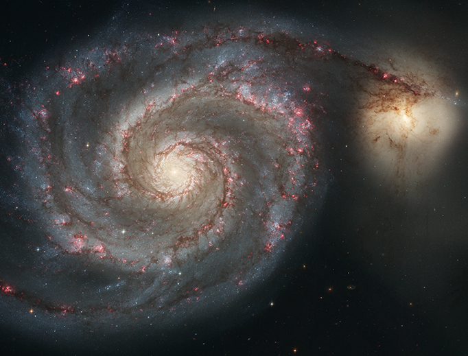 The Whirlpool Galaxy (M51, NGC 5194) and its companion NGC 5195. Photo courtesy of NASA and the European Space Agency. The Whirlpool Galaxy (M51, NGC 5194) and its companion NGC 5195. Photo courtesy of NASA and the European Space Agency.