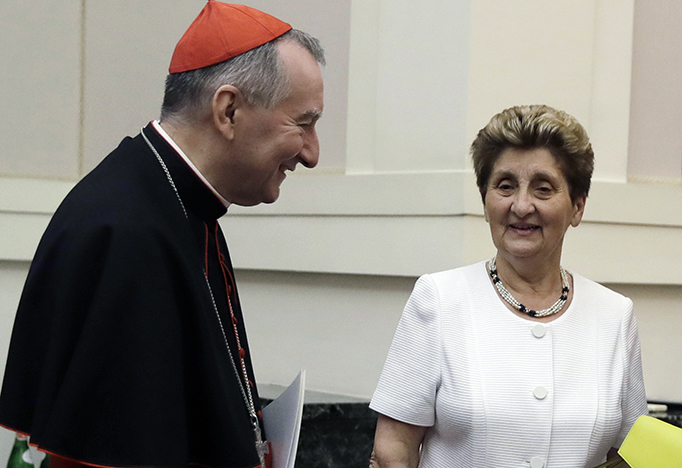 Cardinal Pietro Parolin, the Vatican's secretary of state, meets with Mariella Enoc, the president of Bambino Gesu Pediatric Hospital at an event to release the hospital's annual report at the Vatican. Cardinal Pietro Parolin, the Vatican's secretary of state, meets with Mariella Enoc, the president of Bambino Gesu Pediatric Hospital at an event to release the hospital's annual report at the Vatican.
