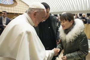 Pope Francis greets a woman after his weekly General Audience, January 8, 2020. Pope Francis greets a woman after his weekly General Audience, January 8, 2020.