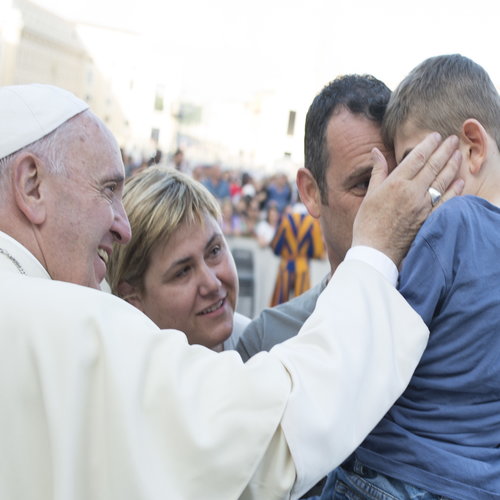 Pope Francis greets a young family after speaking to participants at Rome’s diocesan conference about stages of Christian initiation in St. Peter’s Square on June 16. Pope Francis greets a young family after speaking to participants at Rome’s diocesan conference about stages of Christian initiation in St. Peter’s Square on June 16.