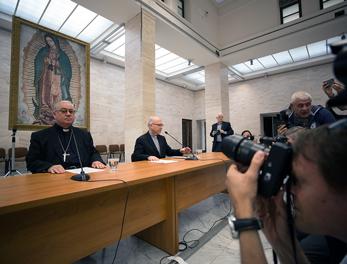Bishop Fernando Ramos, auxiliary bishop of Santiago, and Bishop Juan Ignacio González of San Bernardo, a member of Chile's national commission for the protection of minors, at a press conference on May 18, 2018 announcing the resignation of all 34 Chilean bishops at the close of their 3-day meeting with Pope Francis in Vatican City. Bishop Fernando Ramos, auxiliary bishop of Santiago, and Bishop Juan Ignacio González of San Bernardo, a member of Chile's national commission for the protection of minors, at a press conference on May 18, 2018 announcing the resignation of all 34 Chilean bishops at the close of their 3-day meeting with Pope Francis in Vatican City.