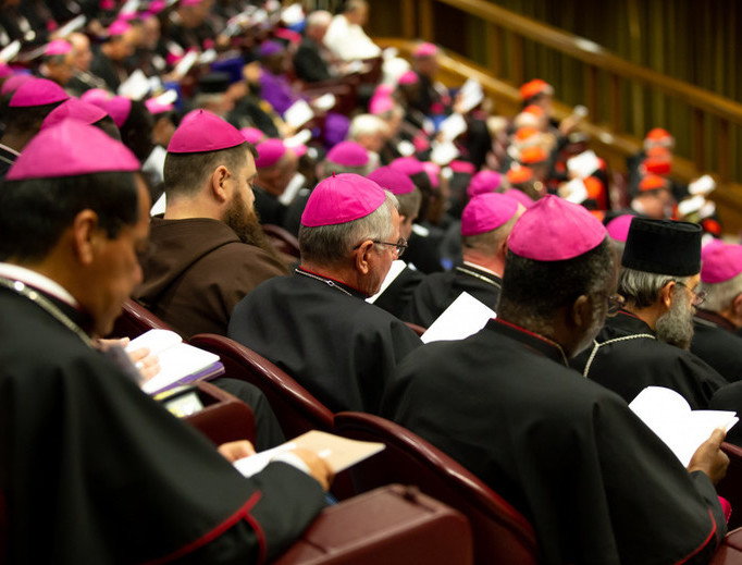Participants pray during a session of the Synod for Young People, the Faith and Vocational Discernment. Participants pray during a session of the Synod for Young People, the Faith and Vocational Discernment.