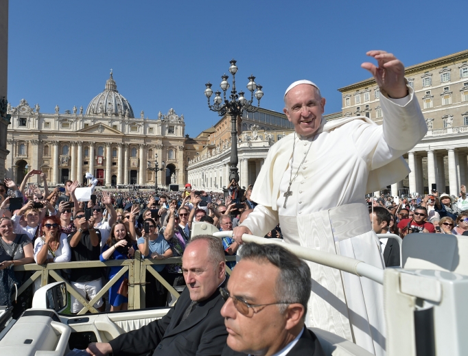 Pope Francis waves to the faithful after celebrating a Mass for the opening of the youth-focused Synod of Bishops Oct. 3 in St. Peter’s Square. The synod, which runs through Oct. 28, brings together 266 bishops from five continents. Pope Francis waves to the faithful after celebrating a Mass for the opening of the youth-focused Synod of Bishops Oct. 3 in St. Peter’s Square. The synod, which runs through Oct. 28, brings together 266 bishops from five continents.