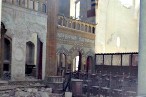 Above, Aleppo's Melkite Greek Catholic Cathedral of the Dormition of the Virgin Mary suffered extensive damage due to heavy fighting. Below is Archbishop Jean-Clément Jeanbart, the Melkite Greek Catholic archbishop of Aleppo. Above, Aleppo's Melkite Greek Catholic Cathedral of the Dormition of the Virgin Mary suffered extensive damage due to heavy fighting. Below is Archbishop Jean-Clément Jeanbart, the Melkite Greek Catholic archbishop of Aleppo.