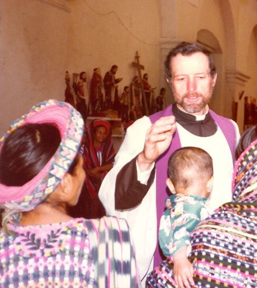 Father Stanley Rother blesses a baby and celebrates Mass in Guatemala. Father Stanley Rother blesses a baby and celebrates Mass in Guatemala.