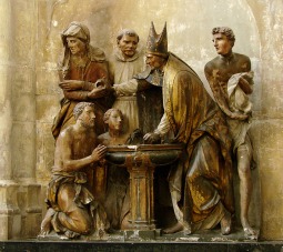 Sculpture in Troyes Cathedral of the baptism of St. Augustine. Sculpture in Troyes Cathedral of the baptism of St. Augustine.