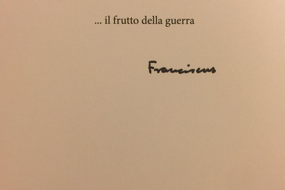 ...the fruit of war — the Pope's comment on the reverse of the photograph. ...the fruit of war — the Pope's comment on the reverse of the photograph.