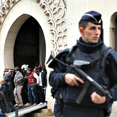 Armed police officers stand outside the Grand Mosque on Jan. 9 in Paris. Armed police officers stand outside the Grand Mosque on Jan. 9 in Paris.