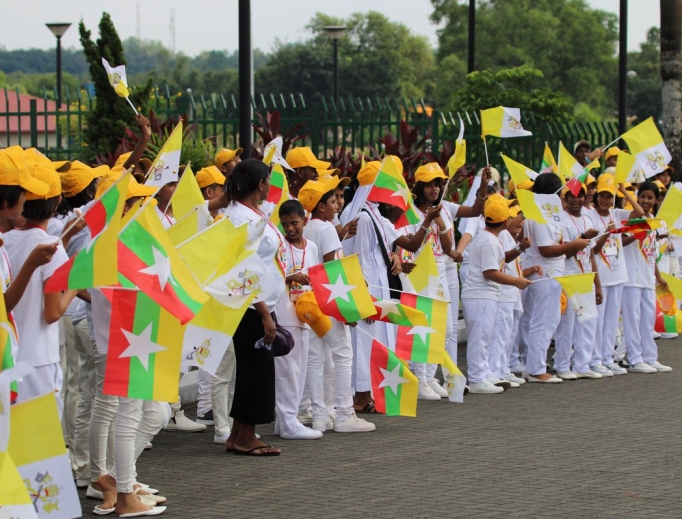 Burmese faithful offer a papal welcome as Pope Francis arrived in Burma. Burmese faithful offer a papal welcome as Pope Francis arrived in Burma.