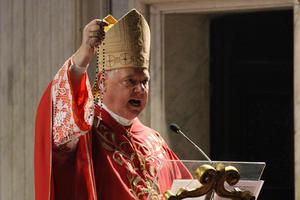 Cardinal Gerhard Müller holds up a Rosary during a homily in his titular church of Sant'Agnese in Agone, Rome, Jan. 21, 2020. Cardinal Gerhard Müller holds up a Rosary during a homily in his titular church of Sant'Agnese in Agone, Rome, Jan. 21, 2020.