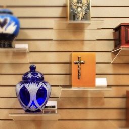 CREMATION RULES. A selection of urns are seen on display in the mortuary at Queen of Heaven Cemetery in Lafayette, Calif. While cremation is not prohibited unless it is chosen for reasons ‘contrary to Christian teaching,’ the Catholic Church prefers that the body of a deceased person be buried in accord with Church custom, according to statements issued by two U.S. archdioceses. CREMATION RULES. A selection of urns are seen on display in the mortuary at Queen of Heaven Cemetery in Lafayette, Calif. While cremation is not prohibited unless it is chosen for reasons ‘contrary to Christian teaching,’ the Catholic Church prefers that the body of a deceased person be buried in accord with Church custom, according to statements issued by two U.S. archdioceses.