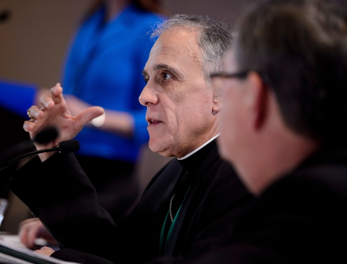 Cardinal Daniel DiNardo, the president of the U.S. Conference of Catholic Bishops, speaks during a press conference at the conference's annual gathering Nov. 12 in Baltimore. Cardinal Daniel DiNardo, the president of the U.S. Conference of Catholic Bishops, speaks during a press conference at the conference's annual gathering Nov. 12 in Baltimore.