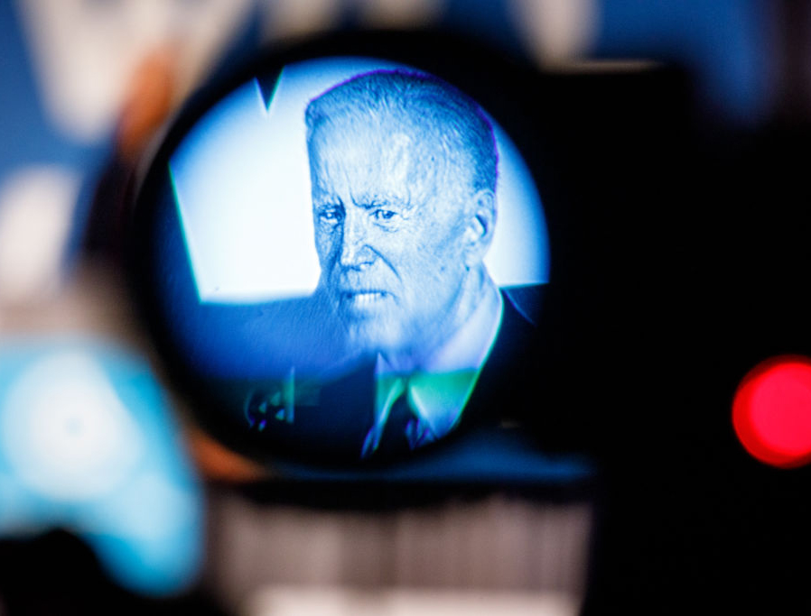 Former vice president and 2020 Democratic presidential candidate Joe Biden, seen through a news camera viewfinder, speaks to a crowd at a Democratic National Committee event June 6, 2019, in Atlanta, Georgia. Former vice president and 2020 Democratic presidential candidate Joe Biden, seen through a news camera viewfinder, speaks to a crowd at a Democratic National Committee event June 6, 2019, in Atlanta, Georgia.