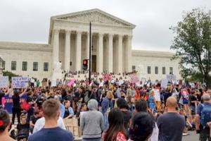 A crowd rallies at the Supreme Court to protest the nomination and the Senate vote for the next Associate Justice October 6, 2018. A crowd rallies at the Supreme Court to protest the nomination and the Senate vote for the next Associate Justice October 6, 2018.