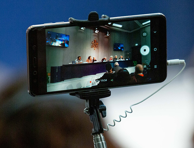 The Oct. 14 Pan-Amazon Synod media conference is seen through a smartphone viewfinder The Oct. 14 Pan-Amazon Synod media conference is seen through a smartphone viewfinder