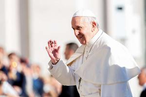 Pope Francis waves to the faithful in St. Peter's Square Sept. 26. Pope Francis waves to the faithful in St. Peter's Square Sept. 26.