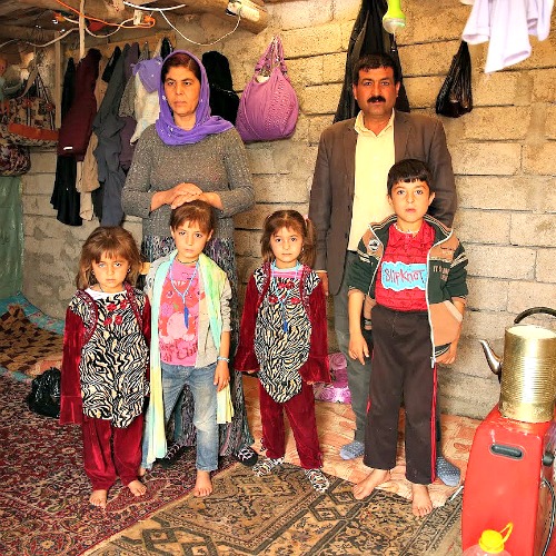 A family at the Sharia Al Haman Hope Refugee Camp in Duhok, Iraq, on March 28.
A family at the Sharia Al Haman Hope Refugee Camp in Duhok, Iraq, on March 28.
