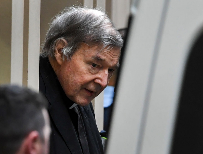 Australian Cardinal George Pell (c) is escorted in handcuffs from the Supreme Court of Victoria in Melbourne on Aug. 21. Cardinal Pell was sent back to jail Aug. 21 after an appeal court, 2-1, rejected his appeal against convictions for child sex abuse. Australian Cardinal George Pell (c) is escorted in handcuffs from the Supreme Court of Victoria in Melbourne on Aug. 21. Cardinal Pell was sent back to jail Aug. 21 after an appeal court, 2-1, rejected his appeal against convictions for child sex abuse.