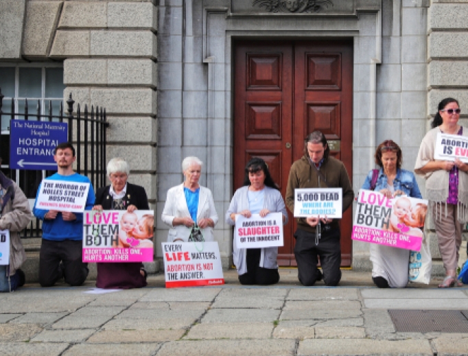 Members of the group ‘Our Lady of Lourdes Protectors’ hold a prayer vigil outside the national maternity hospital in Dublin,Ireland, 2019. Members of the group ‘Our Lady of Lourdes Protectors’ hold a prayer vigil outside the national maternity hospital in Dublin,Ireland, 2019.