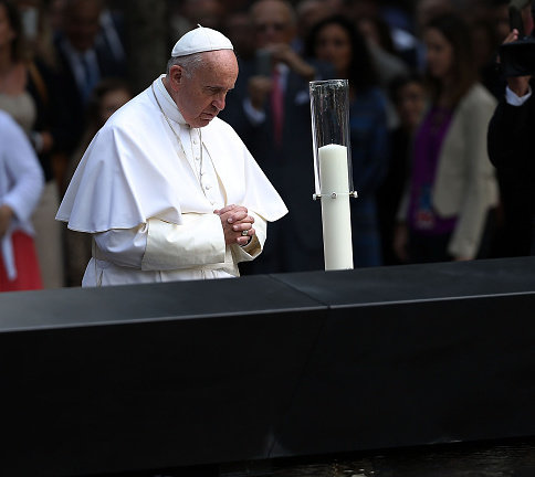Pope Francis prays at Ground Zero on Sept. 25 in New York. Pope Francis prays at Ground Zero on Sept. 25 in New York.