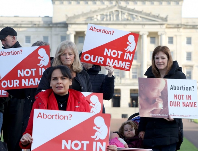 Pro-life campaigners gather with placards at Parliament buildings on the Stormont Estate in Belfast Oct. 21. Pro-life campaigners gather with placards at Parliament buildings on the Stormont Estate in Belfast Oct. 21.