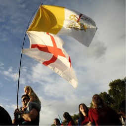 DISPENSING WITH AN ANCIENT BIAS. Pilgrims wave the flags of England and the Vatican as they wait for
a prayer vigil led by Pope Benedict during his 2010 visit. The British government did away with its more than
300-year-old law that stated that a member of the royal family would lose his place in the line of succession if he
married a Catholic. DISPENSING WITH AN ANCIENT BIAS. Pilgrims wave the flags of England and the Vatican as they wait for
a prayer vigil led by Pope Benedict during his 2010 visit. The British government did away with its more than
300-year-old law that stated that a member of the royal family would lose his place in the line of succession if he
married a Catholic.