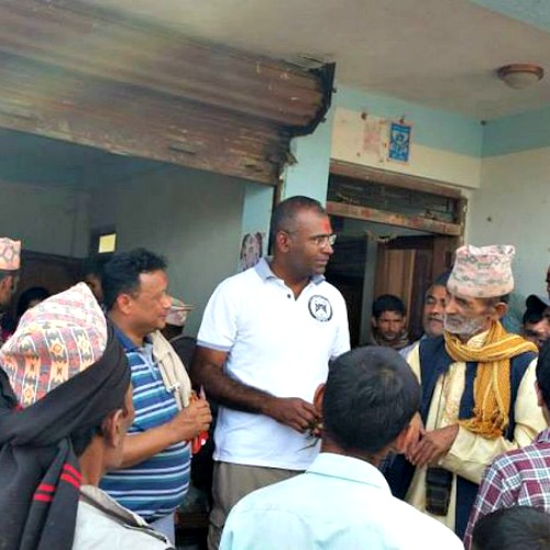 Jesuit Father Augustine (c) and associates distribute relief supplies following the April 25 earthquake in Nepal.
Jesuit Father Augustine (c) and associates distribute relief supplies following the April 25 earthquake in Nepal.