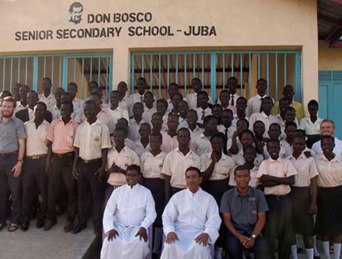 Top to bottom: 1, Salesian priests and lay missionaries operate Don Bosco Gumbo which comprises a parish, secondary school and youth center; 2, CRS staff help with a food drop to internally displaced refugees; 3, South Sudanese dance commemorating the nation's independence on July 9, 2011; 4, Yar Wadok, mother of 5, with her youngest, 3 week-old Akou Marial.
Top to bottom: 1, Salesian priests and lay missionaries operate Don Bosco Gumbo which comprises a parish, secondary school and youth center; 2, CRS staff help with a food drop to internally displaced refugees; 3, South Sudanese dance commemorating the nation's independence on July 9, 2011; 4, Yar Wadok, mother of 5, with her youngest, 3 week-old Akou Marial.